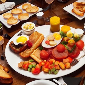 Desayuno completo diario (INR 500 por persona)