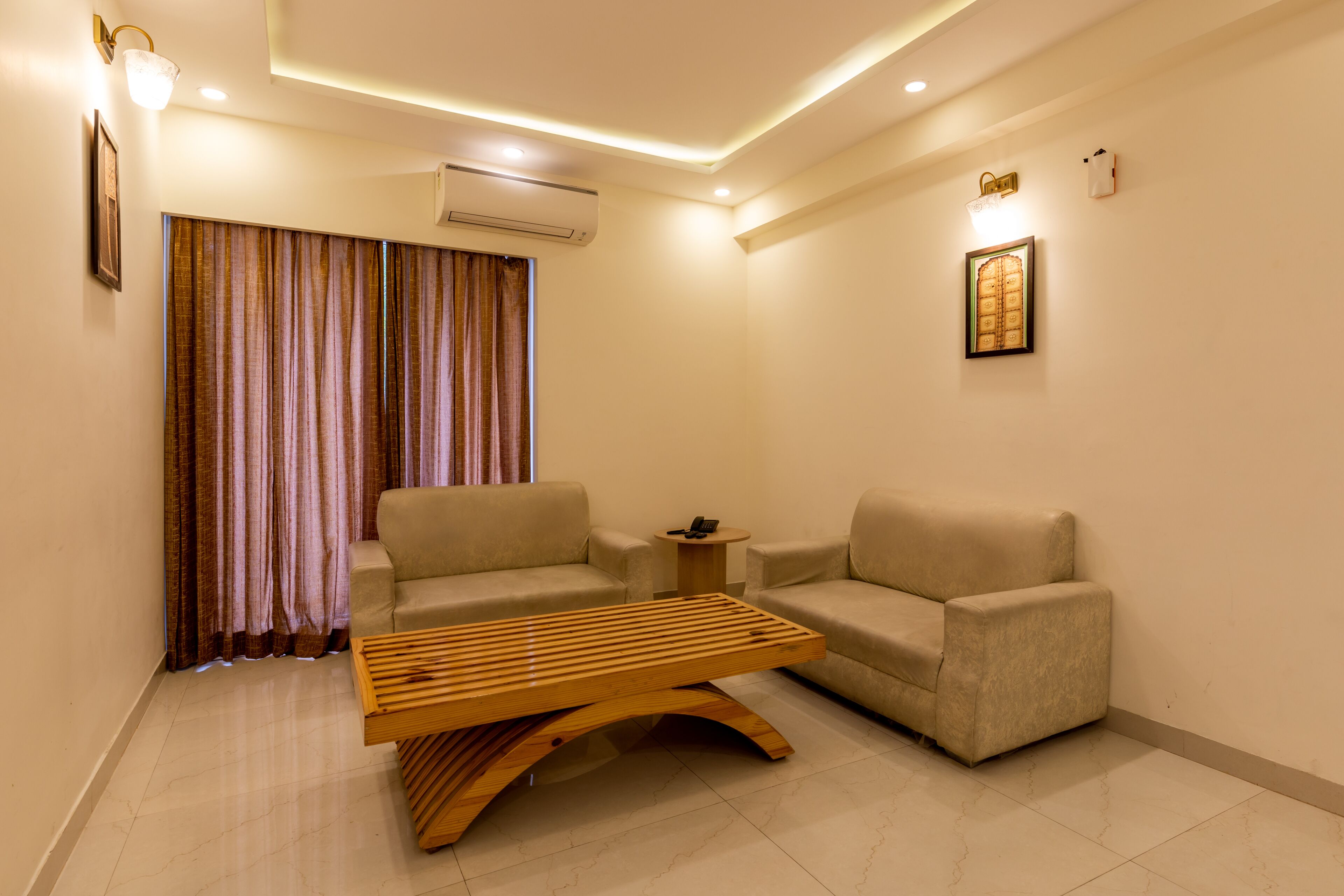 Family Quadruple Room | Living area | 24-inch LED TV with satellite channels, TV, fireplace