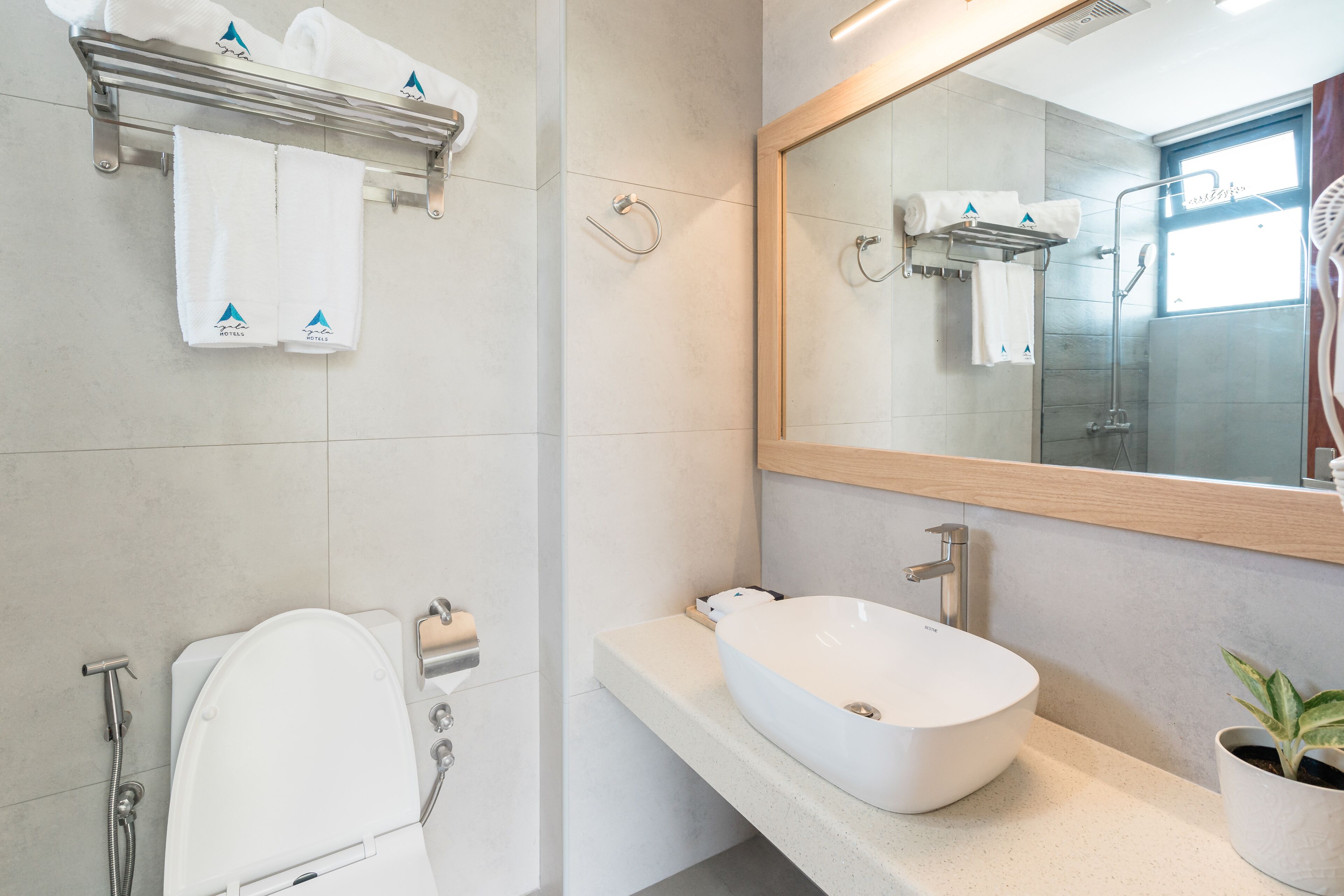 deluxe double room | bathroom | rainfall showerhead, free toiletries, hair dryer, bidet