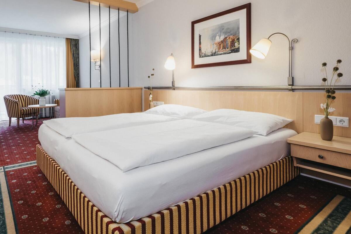Hypo-allergenic bedding, minibar, in-room safe, desk
