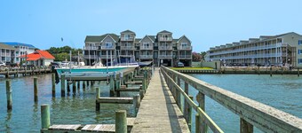 Charlie's Bayside Retreat | South Main Waterfront w/ Private Boat Slip, Screened Porch & Pets
