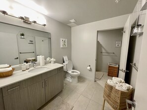 Shower, towels, toilet paper