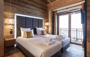 4 室のベッドルーム、WiFi (無料)、ベッドシーツ