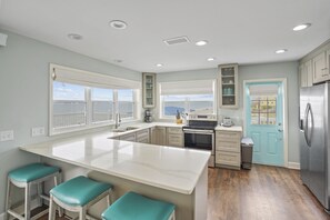 Fridge, microwave, oven, stovetop - Cape Lafayette: Charming North Cape Beachfront Home- Sleeps 12 (Cape San Blas)