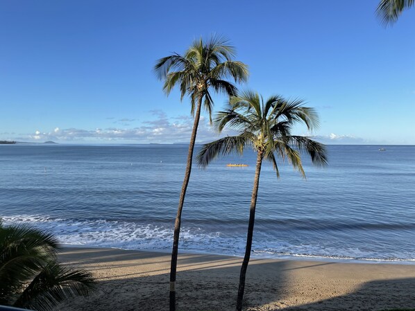 On the beach, sun loungers, beach towels