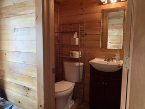 Combined shower/bathtub, hair dryer, towels, toilet paper