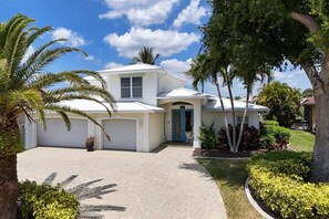 Exterior - SW CAPE CORAL: 5 BR 4 BA CANAL HOME with BOAT DOCK  w/heated / lit pool, jacuzzi (Cape Coral)