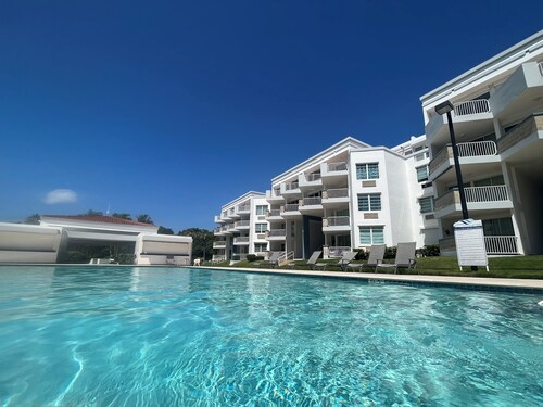 Poolside Penthouse on Natural Caribbean Beach