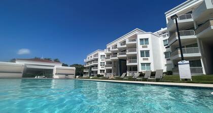 Poolside Penthouse on Natural Caribbean Beach