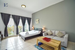 Standard Studio | Living area | 42-inch Smart TV with cable channels, TV - Eddie - Comfortable spacious Studio (Dubai)
