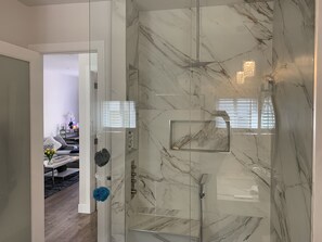 Shower, hair dryer, towels, soap