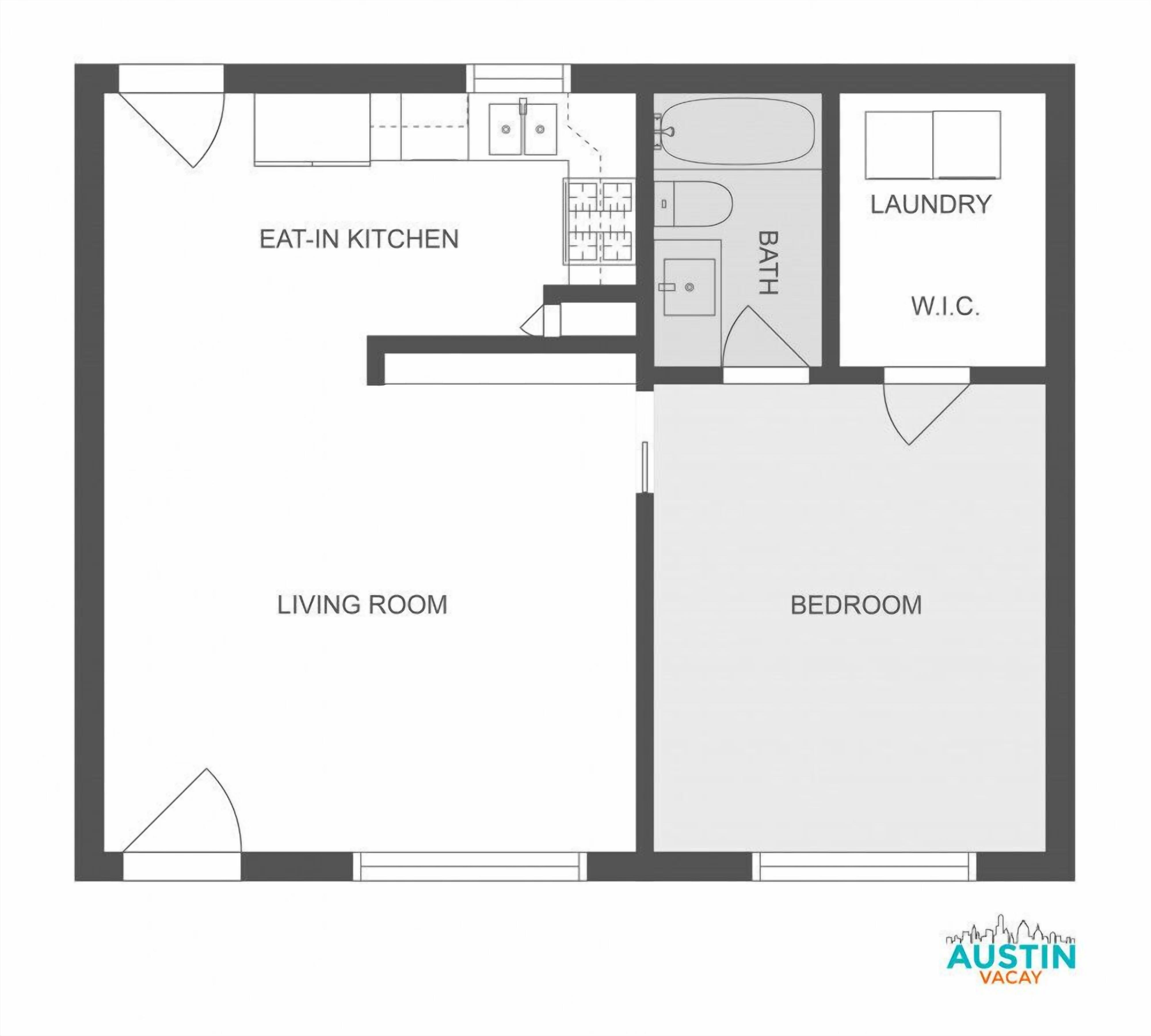 A floor plan with an eat-in kitchen, living room, bedroom, bathroom, and laundry area.