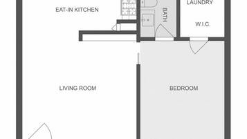 A floor plan with an eat-in kitchen, living room, bedroom, bathroom, and laundry area.