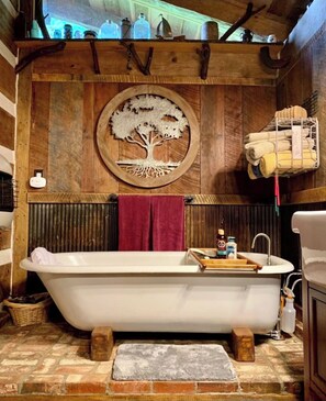 Bathtub, hair dryer, towels, soap