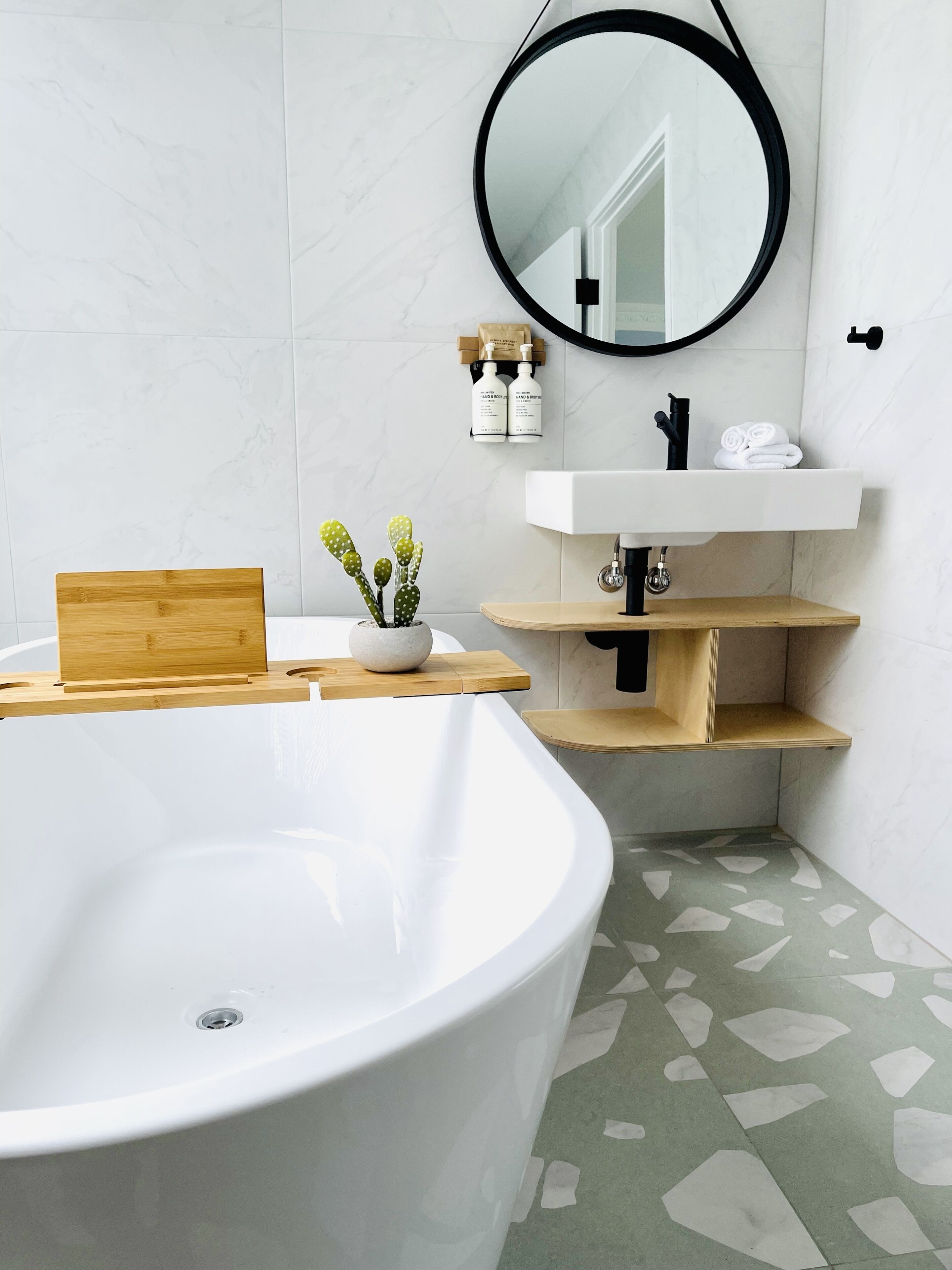 designer toiletries, hair dryer, towels, soap