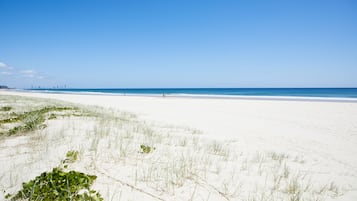 On the beach, white sand