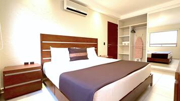Apartment, 2 Bedrooms (Tipo B) | Blackout curtains, iron/ironing board, free WiFi, bed sheets