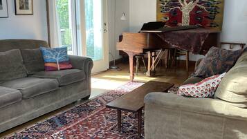 Smart TV, fireplace, books, printers