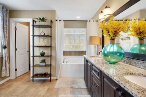 Combined shower/bathtub, hair dryer, towels, soap