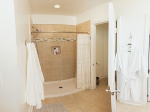 Combined shower/tub, hair dryer, towels, soap