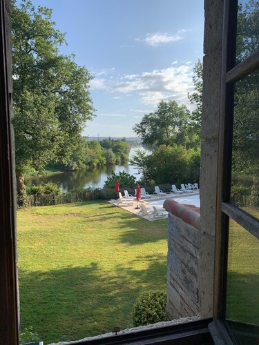 Restored Farmhouse with stunning river views, private pool and games room