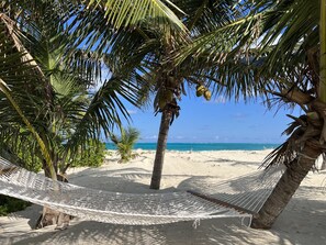On the beach, sun loungers, beach towels