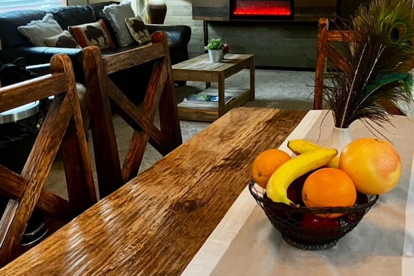 This home shows off it's personality. Our Brazilian dining table adds elegance