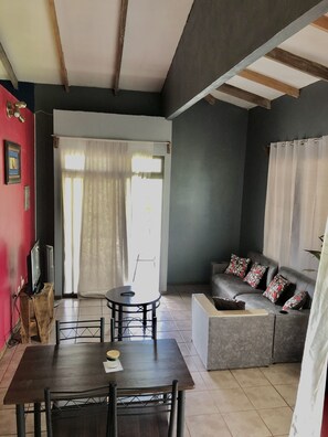 Family Apartment, 2 Bedrooms, Mountain View | Living area - Iguana Garden Downtown (La Fortuna)