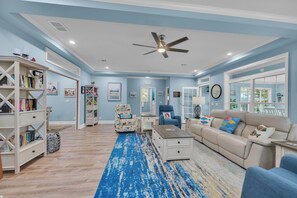 Smart TV, fireplace, books, printers