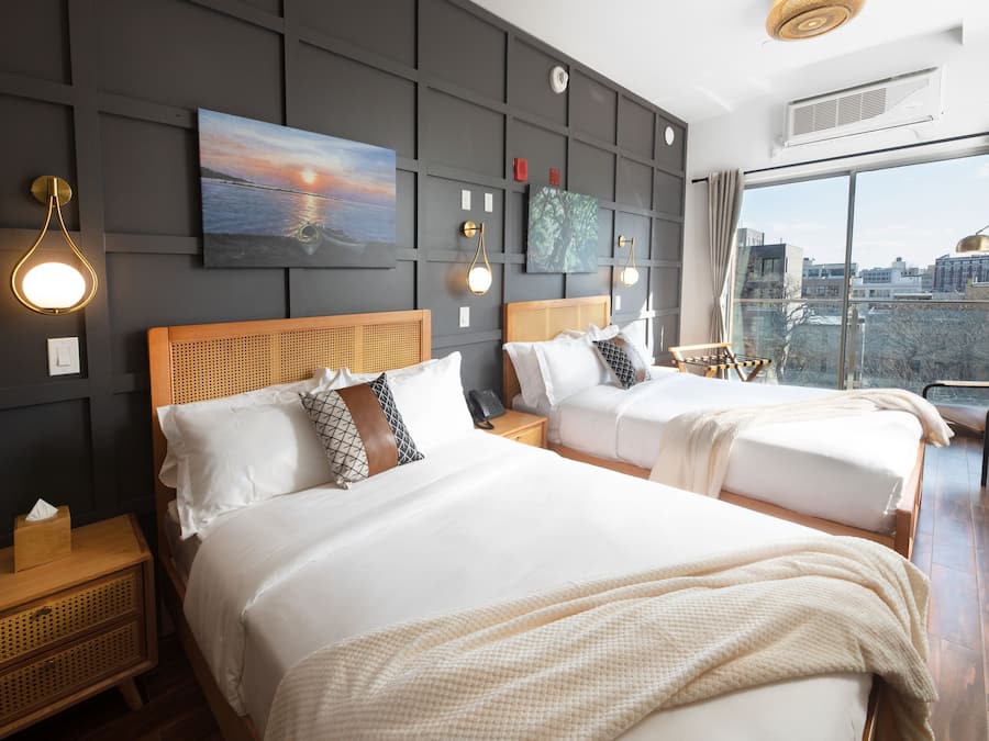 Studio Suite with Balcony - 2 Full Beds | In-room safe, iron/ironing board, free wired internet, bed sheets