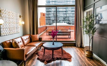 1 BR Suite with Private Patio - Queen Bed | 1 bedroom, in-room safe, iron/ironing board, free WiFi at The Modernist Hotel