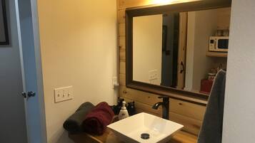 Shower, towels, soap, shampoo