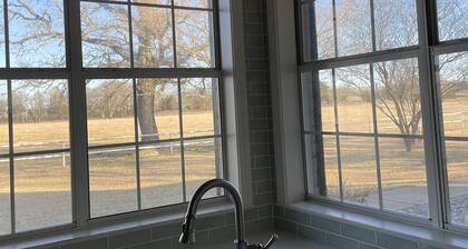 Modern farmhouse retreat between DFW and Houston.
