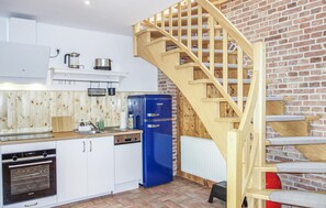 Fridge, stovetop, dishwasher, coffee/tea maker