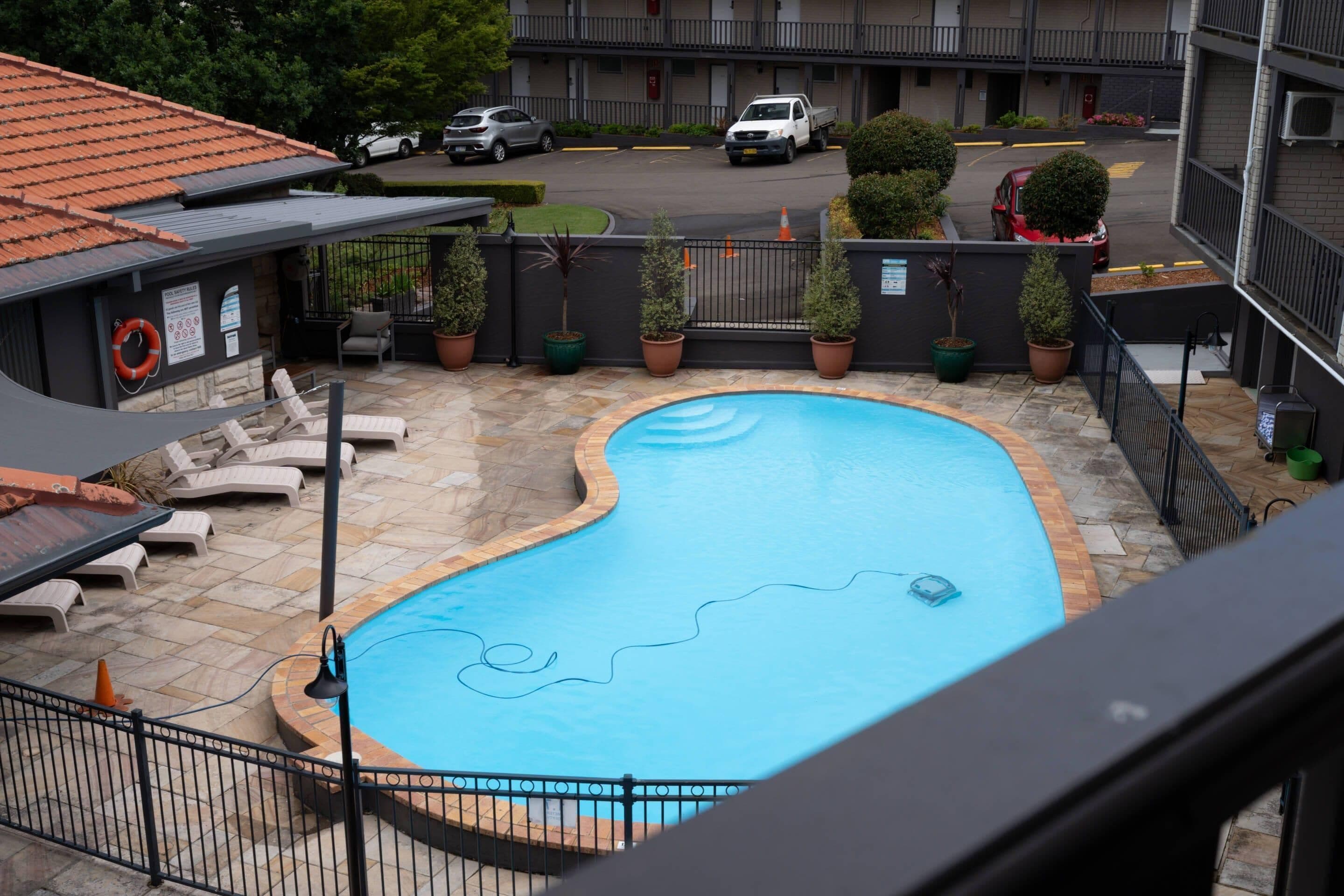 Pool View Room | In-room safe, blackout curtains, iron/ironing board, free WiFi