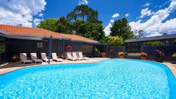 Outdoor pool, open 7:00 AM to 9:00 PM, sun loungers