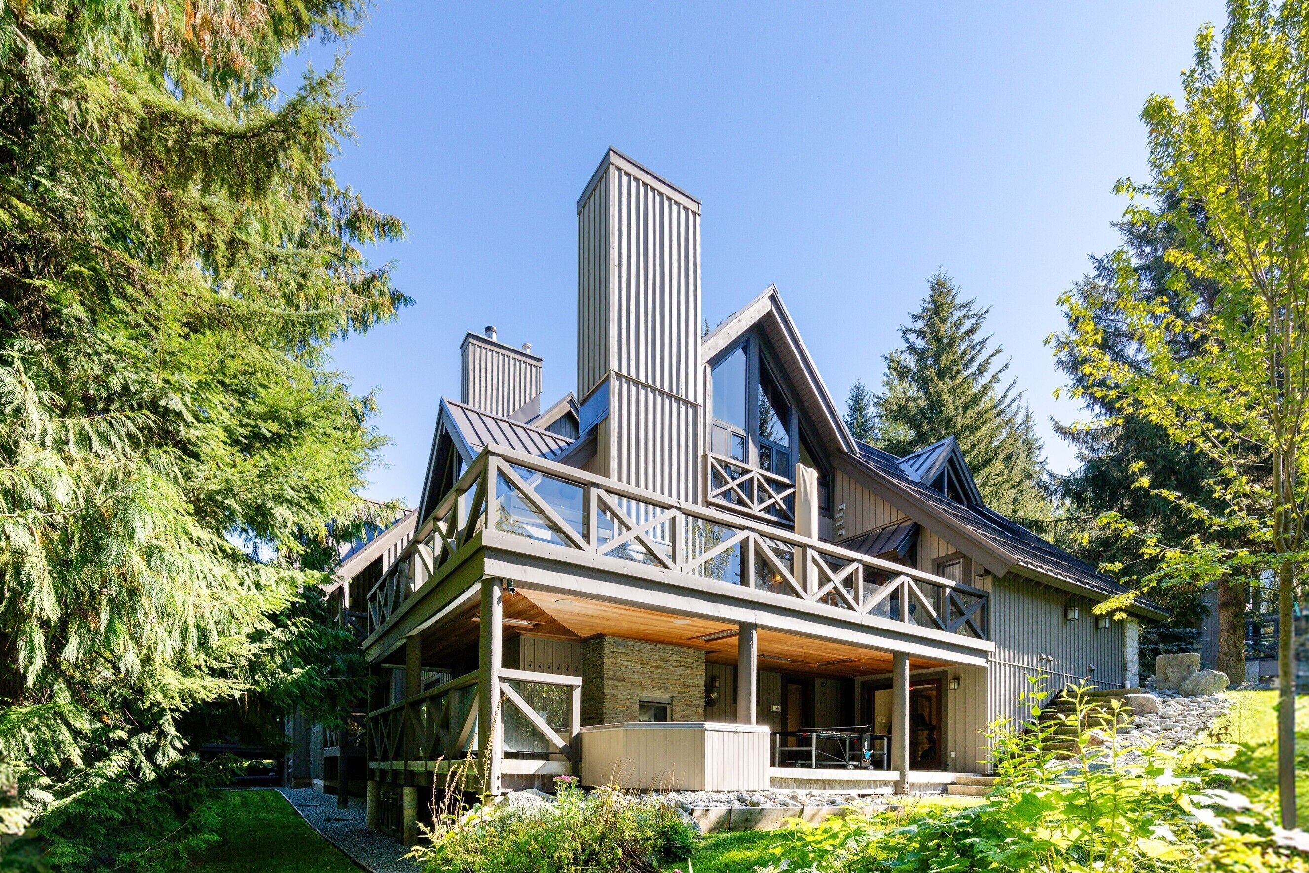 Exterior with ski-in/ski-out access, oversized hot tub and ping-pong table
