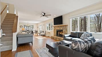 Smart TV, fireplace, foosball, books