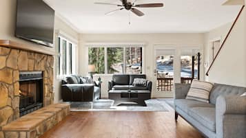 Smart TV, fireplace, foosball, books