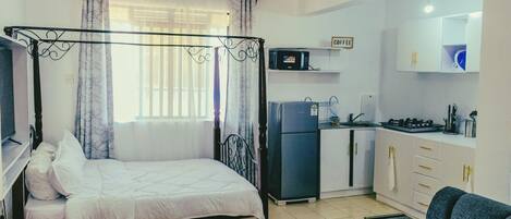 1 dormitori, planxa i posts de planxar, wifi gratuïta i roba de llit