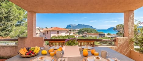 Family Apartment, Multiple Bedrooms, 2 Bathrooms (Erica Primo Piano 150m From the Beach) | Outdoor dining
