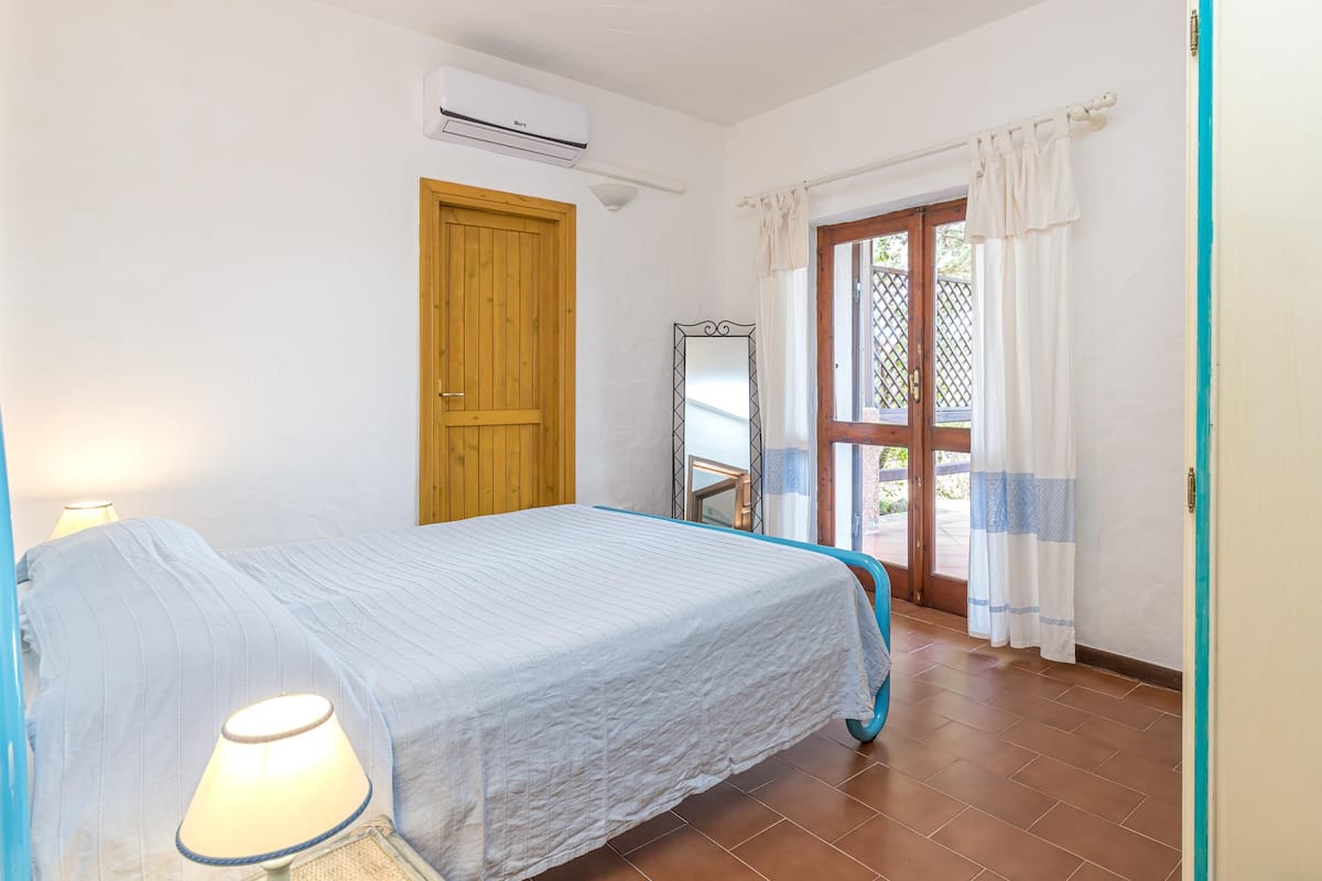 Standard Apartment, Multiple Bedrooms, 2 Bathrooms (Erica Piano Terra 150m From the Beach) | 2 bedrooms, iron/ironing board, bed sheets