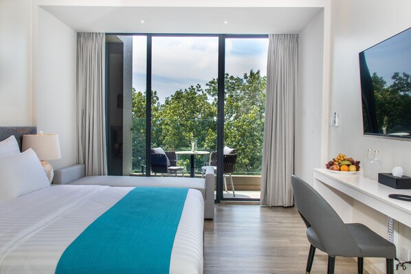 Deluxe Double or Twin Room, 1 Bedroom | Minibar, in-room safe, individually decorated, individually furnished