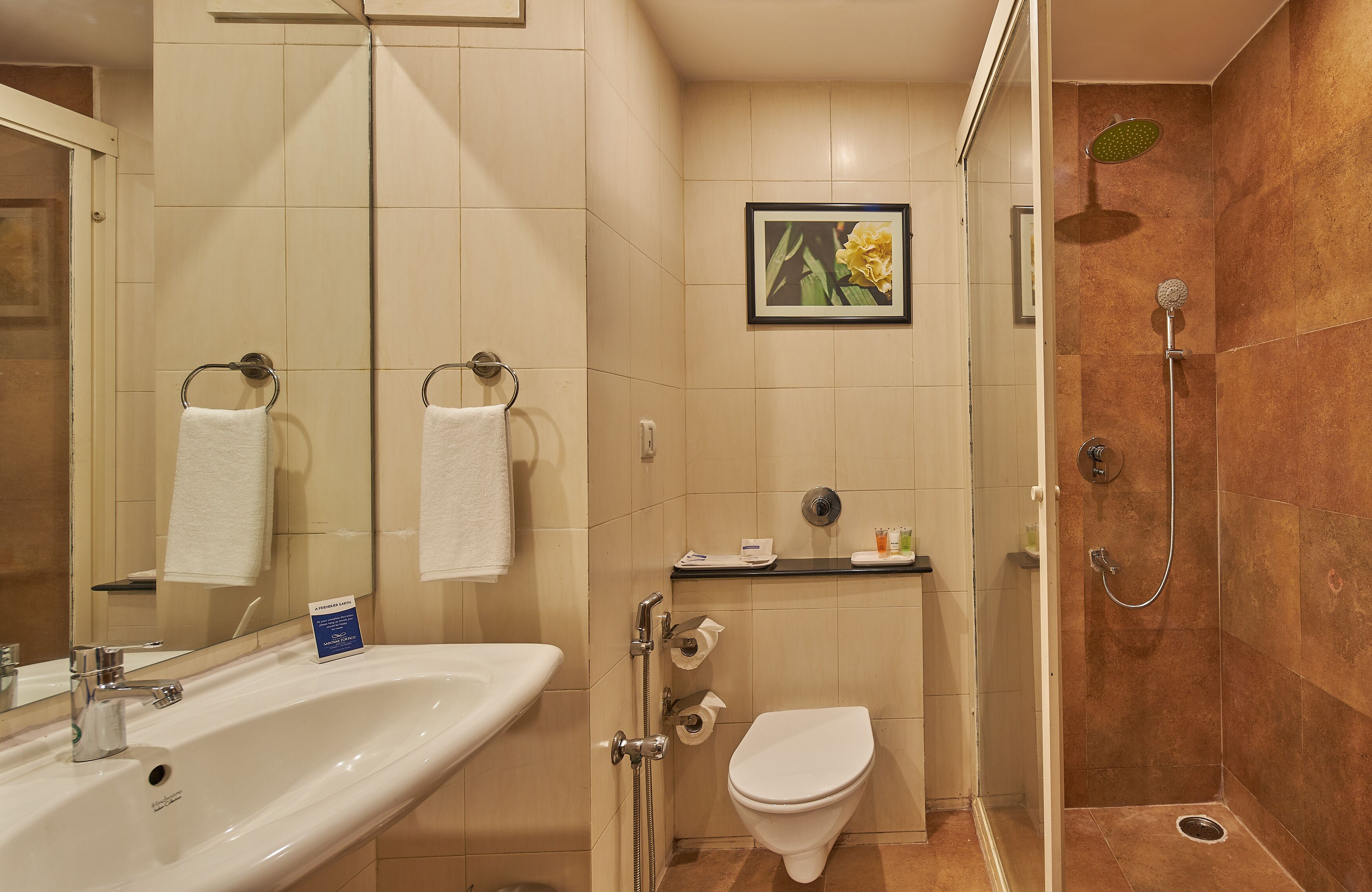 Shower, rainfall showerhead, free toiletries, hair dryer