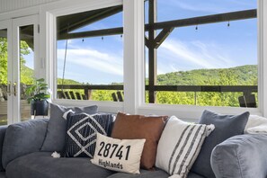 Smart TV, fireplace, table football, books