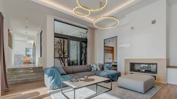 Luxury Villa | Living area | 100-cm Smart TV with satellite channels, TV