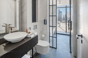 Co-Star Suite | Bathroom | Deep soaking tub, designer toiletries, hair dryer, bathrobes