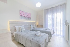 Family Studio Suite, 2 Bedrooms, City View | In-room safe, iron/ironing board, free WiFi, bed sheets