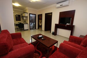 Apartamento família | Área de estar | Impressoras