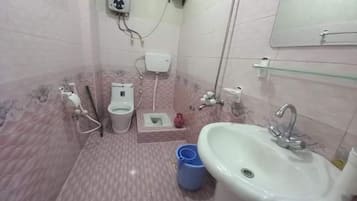 Shower, free toiletries, slippers, towels